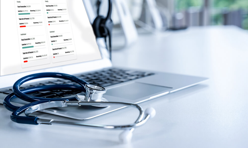 a stethoscope on an open laptop